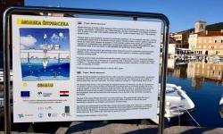 Floating Bin Installed in Cres Port to Filter Sea Water and Collect Waste